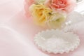 Rock slat on white plate with artificial flower