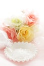 Rock slat on white plate with artificial flower