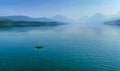 A rock splashing in beautiful Lake McDonald in Glacier National Park by West Glacier in Montana Royalty Free Stock Photo