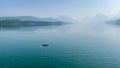 A rock splashing in beautiful Lake McDonald in Glacier National Park by West Glacier in Montana Royalty Free Stock Photo