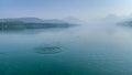 A rock splashing in beautiful Lake McDonald in Glacier National Park by West Glacier in Montana Royalty Free Stock Photo