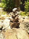 Rock Stack or Stone Balancing in the Garden. Royalty Free Stock Photo