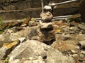 Rock Stack or Stone Balancing in the Garden. Royalty Free Stock Photo