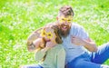 Rock star concept. Child and father posing with star shaped eyeglases photo booth attribute at meadow. Dad and daughter Royalty Free Stock Photo