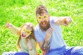 Rock star concept. Family spend leisure outdoors. Child and dad posing with star shaped eyeglases photo booth attribute Royalty Free Stock Photo