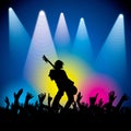 Rock star performing with guitar on abstract background Royalty Free Stock Photo