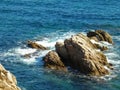 Rock sticking out of the mediterrean Sea.