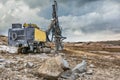 Rock and stone drilling in a building site Royalty Free Stock Photo