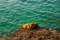 Rock, stone and emerald seawater. Polignano a Mare, Italy