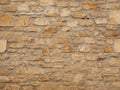 Rock stones old weathered handcrafted stone wall background of brick horizontal stone outdoor facade
