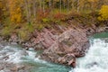 Rock in stream flow of mountains river fall season Royalty Free Stock Photo