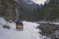 Sleigh rides in the Tatras, sleighs along the stream Royalty Free Stock Photo