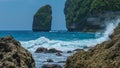 Rock in Tembeling Coastline at Nusa Penida island, Ocean Waves in Front. Bali Indonesia