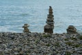 Rock towers built from boulders situate on shore of the lake Constance, Bodensee.