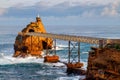 The Rock of the Virgin Mary, an iconic landmark of Biarritz, France and the metal bridge which leads to it. Royalty Free Stock Photo