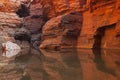 Rock wall reflections in a gorge, Karijini NP, Australia Royalty Free Stock Photo