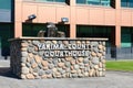 Rock wall sign with fountain outside Yakima County Courthouse