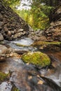 Rock Wall and Stream Royalty Free Stock Photo