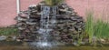 Rock Wall Water Pond Fountain Royalty Free Stock Photo