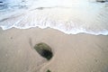 Rock and wave on the Ao Sen beach Phuket Royalty Free Stock Photo