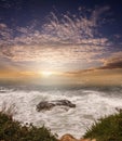 Rock in the waves sunset mermaid stone Royalty Free Stock Photo