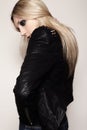 Rock woman in fashion leather jacket with dark evening make-up