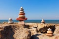 Rock zen pyramid of colorful pebbles on the background of the sea. Concept of balance, harmony and meditation Royalty Free Stock Photo