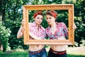 Rockabilly hen-party in park. Feet of girls in the picture frame