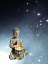 Rocked statue of budha isolated in bokeh background Royalty Free Stock Photo