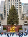 Rockefeller Center Christmas Tree and statue of Prometheus at the Lower Plaza of Rockefeller Center in Midtown Manhattan Royalty Free Stock Photo