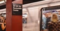 Rockefeller Center Subway with People Entering Train Royalty Free Stock Photo