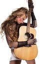 Rocker girl with acoustic guitar Royalty Free Stock Photo