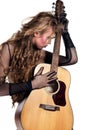 Rocker girl with acoustic guitar Royalty Free Stock Photo