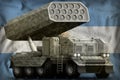 Rocket artillery, missile launcher with grey camouflage on the Argentina national flag background. 3d Illustration