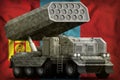 Rocket artillery, missile launcher with grey camouflage on the Mongolia national flag background. 3d Illustration