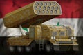 Rocket artillery, missile launcher with sand camouflage on the Syrian Arab Republic national flag background. 3d Illustration
