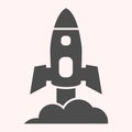 Rocket launch glyph icon. Spacecraft flying up, getting off the ground. Astronomy vector design concept, solid style