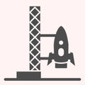 Rocket launch glyph icon. Spaceship with ladder stand platform. Astronomy vector design concept, solid style pictogram Royalty Free Stock Photo