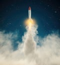 Rocket missle flying to the stars . Dream come true concept start up Royalty Free Stock Photo