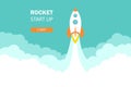 Rocket launch in the sky flying over clouds. Space ship in smoke clouds. Business concept. Start up template. Horizontal Royalty Free Stock Photo