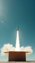 Rocket launching from a cardboard box under a clear blue sky, innovation and creativity concept Royalty Free Stock Photo