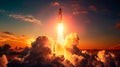 A rocket is launching into the sky, with the sun setting in the background Royalty Free Stock Photo