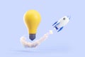 Rocket and lightbulb on blue background. Business startup and idea Royalty Free Stock Photo