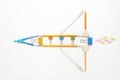 A rocket made of pencils on a white background, the pursuit of success, children`s imagination and learning. Free thinking,