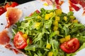 Rocket salad with dried Spanish ham Royalty Free Stock Photo
