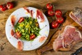 Rocket salad with dried Spanish ham Royalty Free Stock Photo
