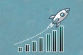 Rocket symbolizing growth, trajectory showing progress over bar chart representing financial success on blue background