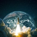 Rocket takes off. Spacecraft flies near the planet earth and the starry sky. Royalty Free Stock Photo