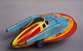 Isolated tin toy with battery from the 1950s space rocket from the planet Mars