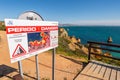 Rockfall hazard danger sign in Lagos, Portugal